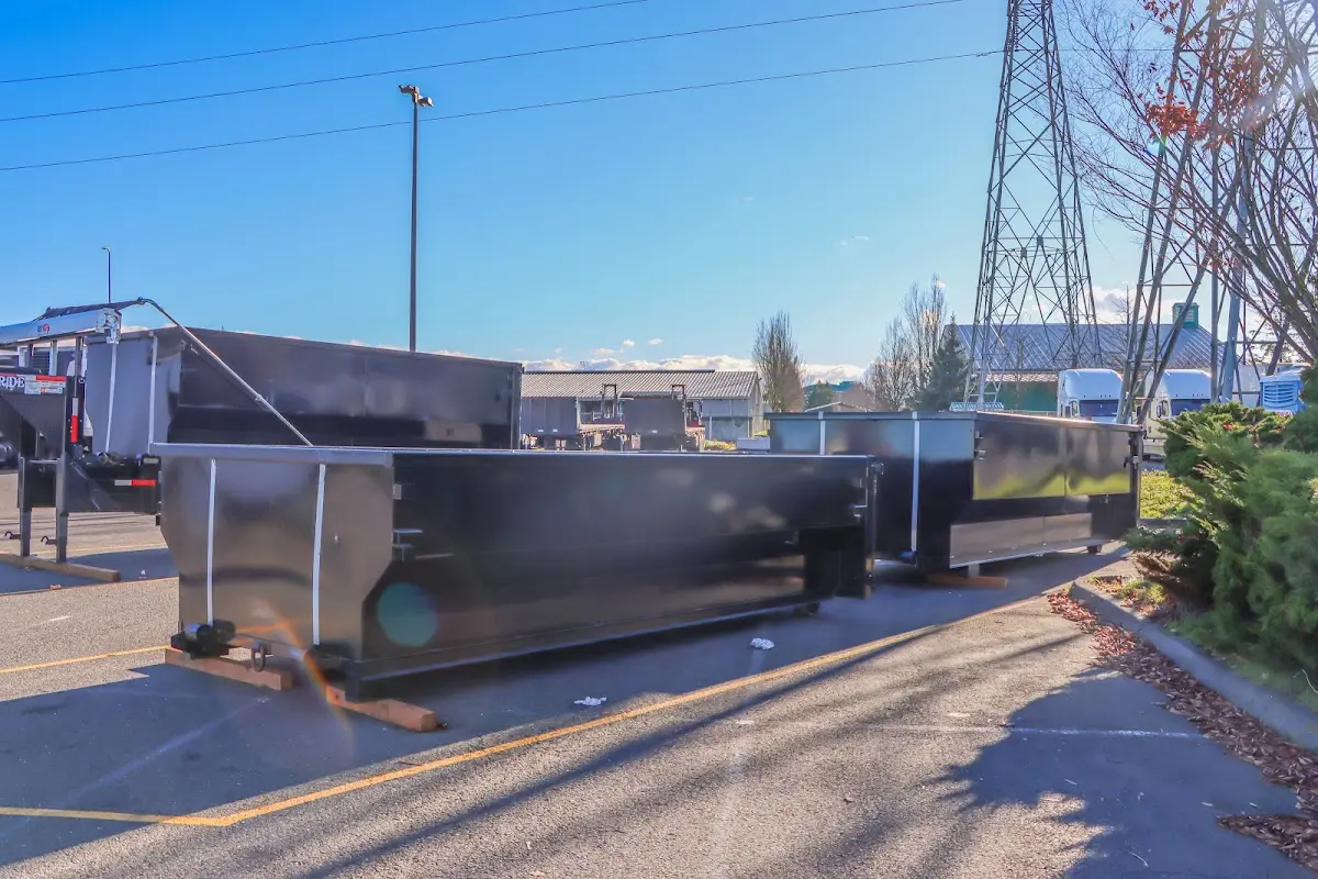 Roll-off dumpster ready for waste disposal at job site for Concrete Dumpster Rental in Fairhaven